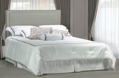 Tête de lit simple mais unique à hauteur réglable, disponible en différents tissus et couleurs.