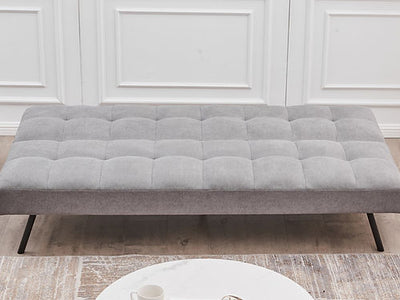 Canapé-lit gris : mousse à mémoire de forme et pieds noirs élégants