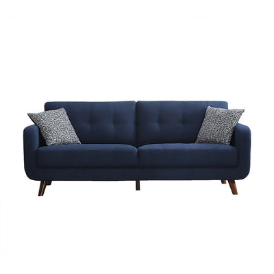 blue tufted sofa